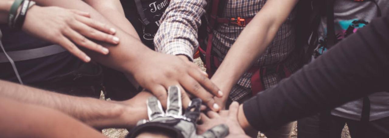 hands huddled together